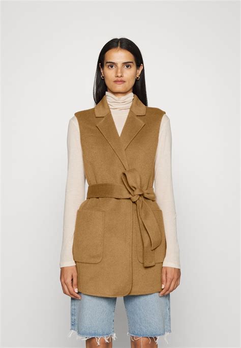 michael kors womens suit vest|Michael Kors belted vest.